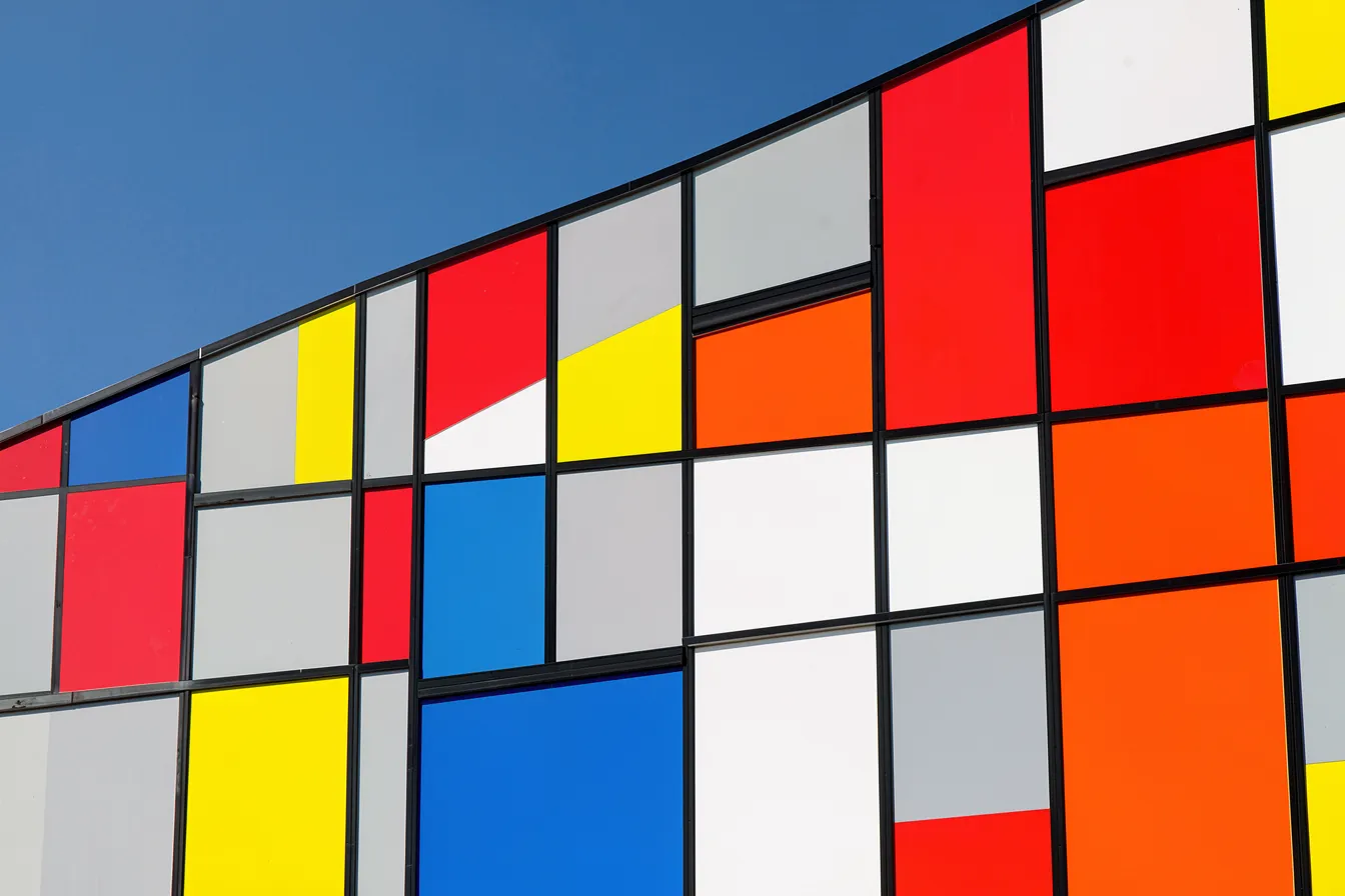 De Stijl building facade with primary-colour panels and black structural lines